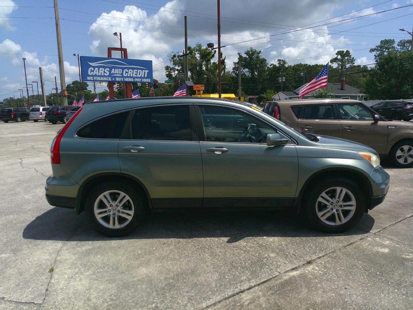 2010 GREEN HONDA CR-V EX-L (5J6RE3H79AL) , located at 10405 Abercorn Street, Savannah, GA, 31419, (912) 921-8965, 31.988262, -81.131760 - Photo#4